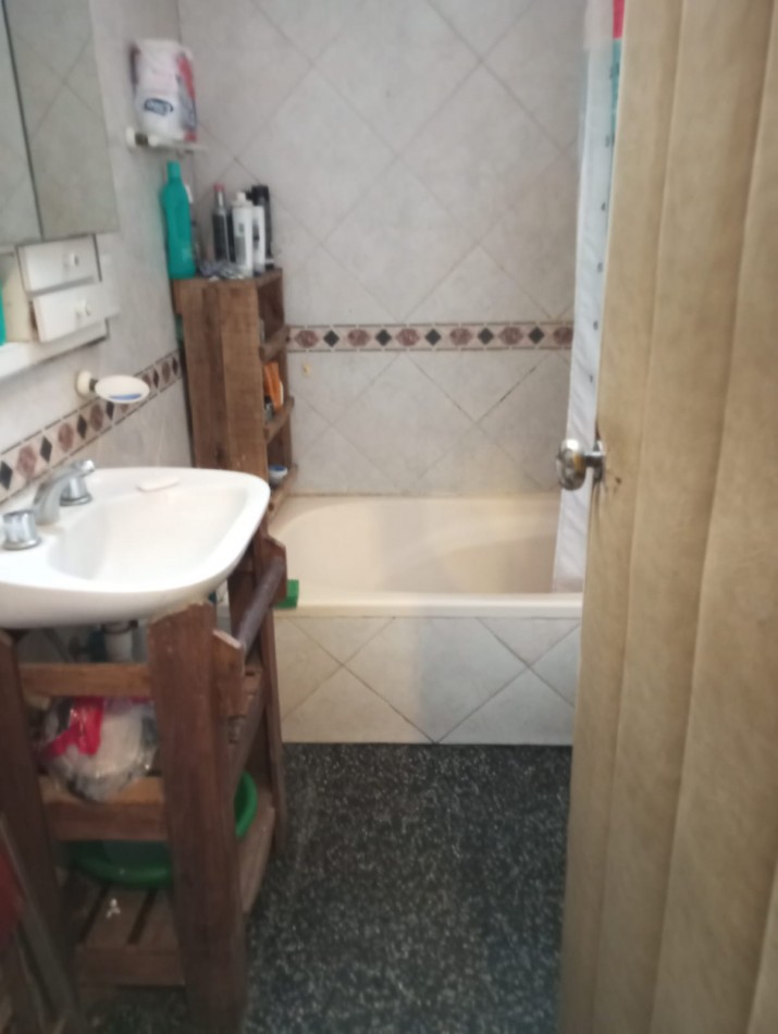 P.H.PLANTA BAJA3 AMBIENTES CON QUINCHO DTO 3 AMBIENTES Y GARAGE